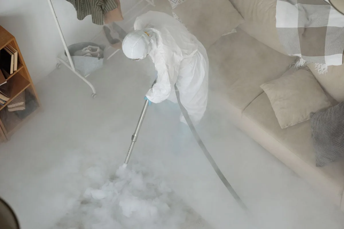 Biohazard cleanup technician in protective equipment, Port Royal, SC